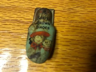 Vintage Buster Brown Shoes Advertising Premium Tin Clicker