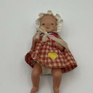 Occupied Japan Celluloid Jointed Baby Doll With Bottle & Diaper Dressed