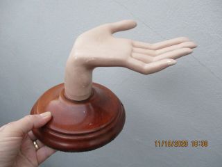 A Vintage Female Mannequin Hand Mounted On A Wooden Base.
