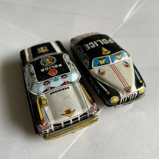 Two Vintage Friction Tin Police Cars Made In Japan