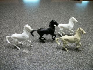 Four Vintage Marx Playset Horses