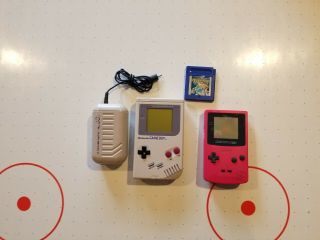 Vintage Nintendo Gameboy And Gameboy Color With Pokemon Blue Game