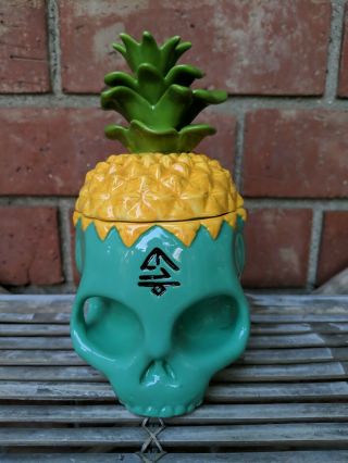Geeki Tikis Green Skull Pineapple Grass Skirt Tiki Mug