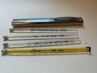 Four Vintage Glass Thermometers With Metal Case