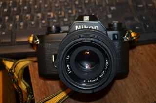 Vintage Nikon Em Camera Series E 50mm 1:1.  8 With Lens -