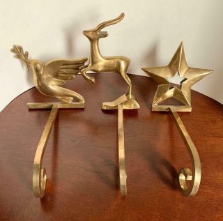 3 Vintage Heavy Brass Christmas Stocking Holders Hangers Long Arm Star Deer Dove