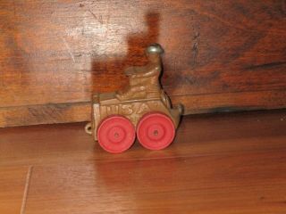 Vintage Barclay Manoil Lead Soldier On Tractor With Wood Wheels