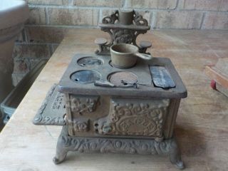 Vintage Cast Iron Eagle Doll House Stove With Org,  761 Cook Pot 6 " Wide By 5 "