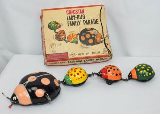 Vtg Cragstan Wind Up Tin Toy Mechanical Lady Bug Family Parade Repair Video