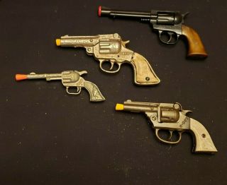 4 Vintage Pressed Metal,  Steel Play Western Guns - Smoky - Bang O - C - Boy - Edison