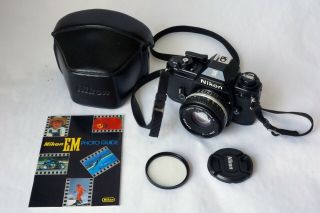 Vintage Nikon Em 35mm Camera W/ Series E 50mm 1:1.  8 Lens And Leather Case