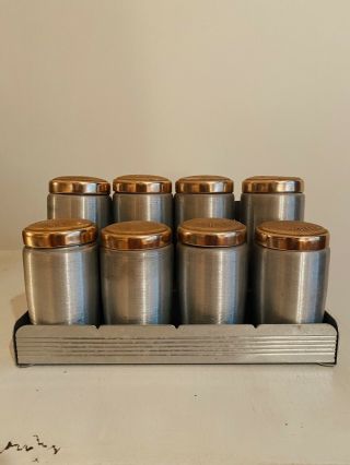 Vintage Kromex Aluminum Spice Set 8 Jars With Copper Colored Lids In Wall Rack