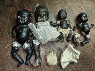 4 Vintage Antique Miniature Porcelain Bisque Jointed Black Baby Dolls