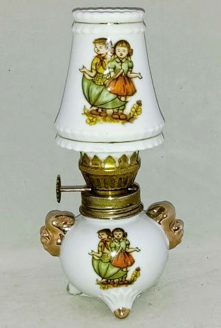 Mini Porcelain Oil Lamp 6 " W/ Matching Globe Hummel Style Umbrella Boy & Girl