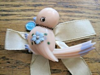 Vintage Celluloid Plastic Baby Bird Pin Pink Blue Flowers Religious Medal 2 " L