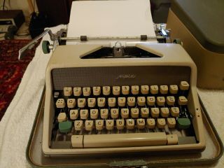 Vintage Olympia Deluxe Portable Typewriter W/case