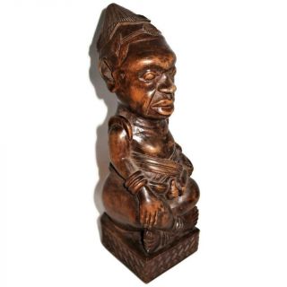 Vintage African Hand Carved Wooden Statue Man Sitting W/ Hat,  10 1/2 "