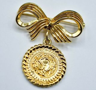 St.  John Signed Pin Brooch Gold Tone Bow Coin Dangle Medallion Vintage Chic Bin7