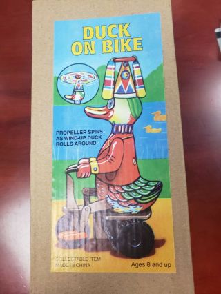 Collector Series Duck On A Bike Windup Tin Toy Nib