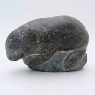 Vintage Inuit Stone Carving Featuring A Seal Lying On A Rock,  Signed Johnassie