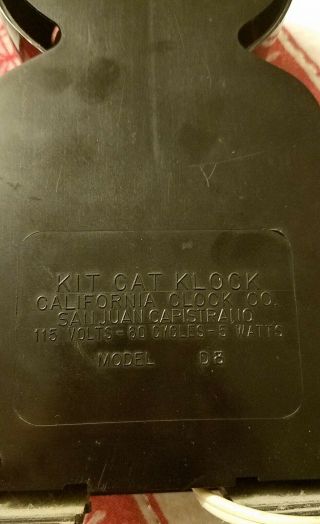 Vintage 1960 ' s kit cat clock,  electric,  D8 Black Jeweled 3