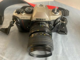 Vintage Nikon FM10 35mm SLR Film Camera with 35 - 70 mm Lens Kit and Leather Case 2