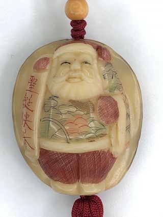 2 African Tagua Nut Santa Christmas Ornaments Or Necklaces Hand Carved In China