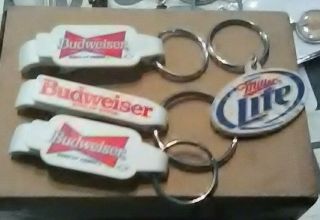 3 Budweiser And,  1 Miller Lite Bottle Opener And Key Chains