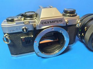 VTG Olympus OM - 10 W/ Rokinon 1:3.  5 - 4.  5 50mm Lens | | 2