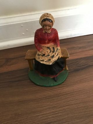 Vintage Cast Iron Amish Woman Sitting On Bench Knitting Door Stop Bookend