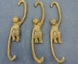 Vintage Hanging Cast Iron Monkeys,  7 - 1/2 " Long