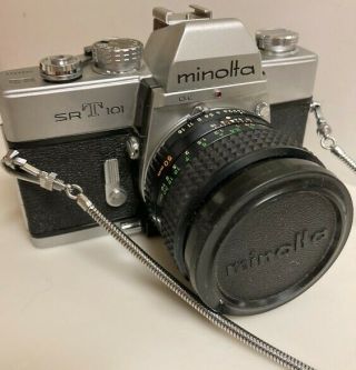 Vintage Minolta SRT 101 Kit - 50mm,  zoom lens,  converter,  flash,  and case 2