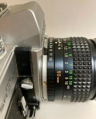 Vintage Minolta SRT 101 Kit - 50mm,  zoom lens,  converter,  flash,  and case 3