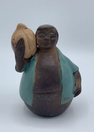 Chulucanas Signed Peruvian Folk Art Clay Pottery Of A Man Carrying A Pumpkin