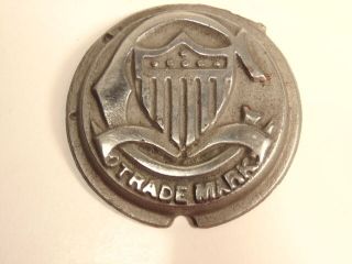 Round Metal Cap Or Lid Showing Large " C " And Star/stripes On Shield Trade Mark