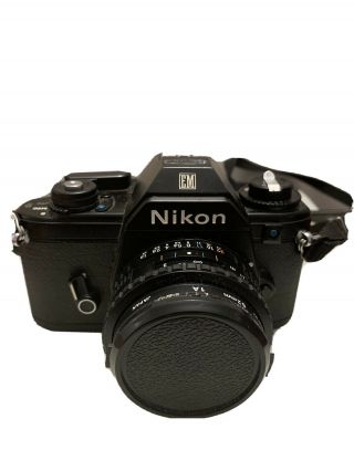 Vintage Nikon Em 35mm Canera With Nikon Series E 50 Mm 1:1.  8 Lens