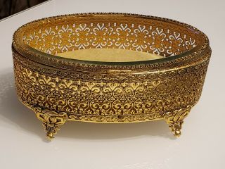 Vintage Footed Gold Tone Filigree Ormolu Jewelry Box Beveled Glass Lid Detailed