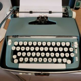 Smith Corona Scm - Sterling Blue Typewriter W/ Case,  Instruction Book
