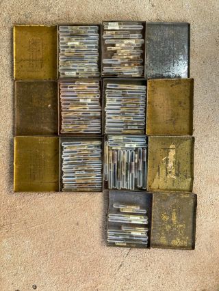 Over 70 Vintage Catgut And Silkworm Sutures In Glass Tubes In Tins.