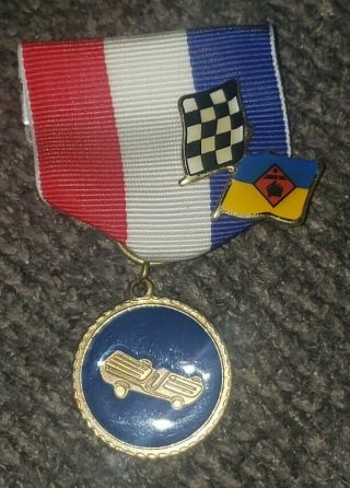 Vintage Boy Scouts Blue Pinewood Derby Medal Pin Rare Checkered Flag