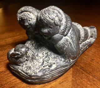 A Wolf Sculpture Hand Carved Soap Stone 2 Children With Rabbit