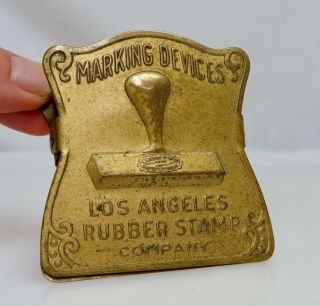 L.  A.  Rubber Stamps Vintage Antique Advertising Brass Paper Clip - 80578