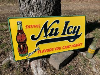 " Nu Icy Soda " Embossed Metal Advertising Sign (23.  5 " X 11.  5 ")