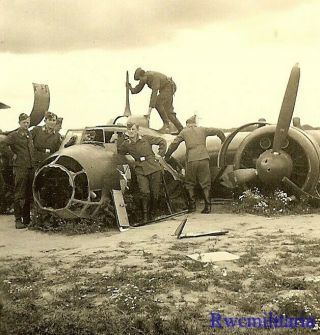 Best Luftwaffe Airmen Look Over Shot Down Do.  17 Bomber In Field