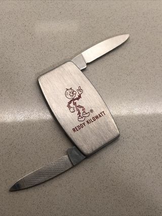 Vintage 1970’s Reddy Kilowatt Pocket Knife File Zippo Sign Lighter