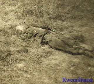 Somber Us Soldier View Kia German Officers Body Laying In Field