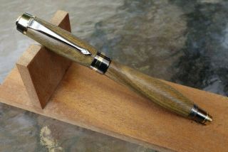 Handmade Fountain Pen In Lignum Vitae - With Gun Metal And Gold Hardware