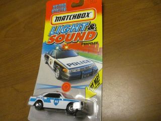 Matchbox Light & Sound Mercedes Benz Police Car - White,  Carded