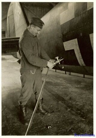 Press Photo: Great Luftwaffe Ground Crewman Preparing Ju - 88 Bomber In Hangar