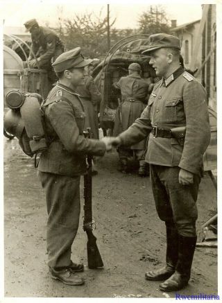 Press Photo: End Game Wehrmacht Officer Welcomes Soldier; Krakau,  Poland 1944